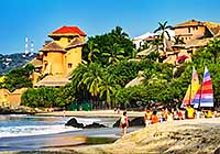 Lodgings and sailboats at north end of La Ropa Beach